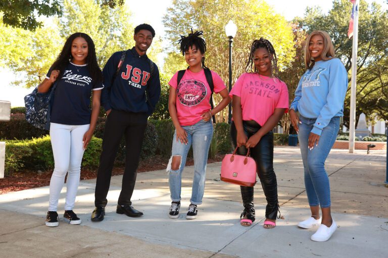 JSU students standing and smiling