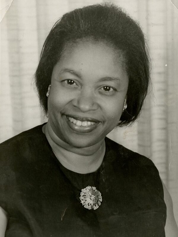 Black and white headshot of Margaret Walker smiling at the camera.